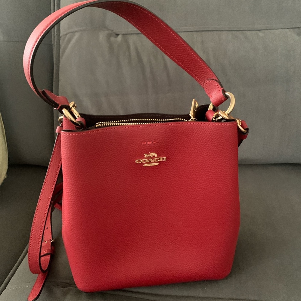 Like new coach bucket bag red. Only used few times